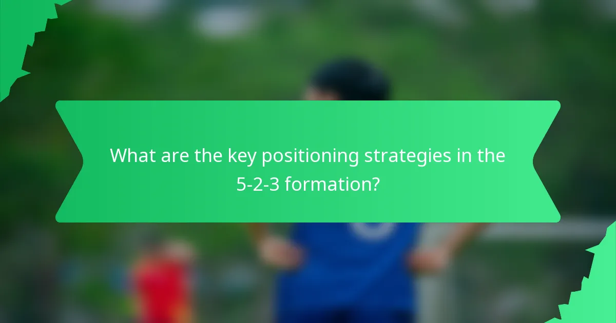 What are the key positioning strategies in the 5-2-3 formation?